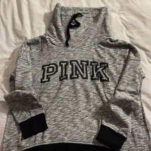 Pink sweater grey and black size Large